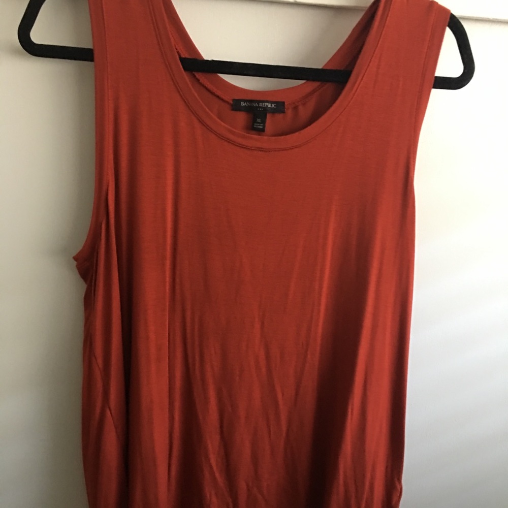 Orange Tank. Opened back with lining.